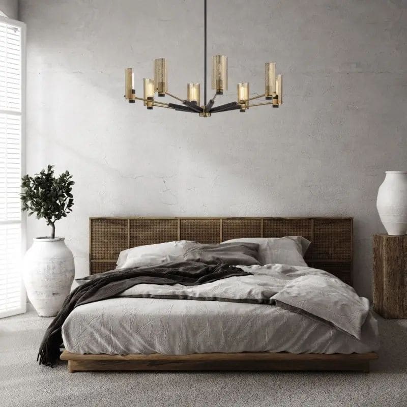 lustre bronze laiton au dessus d'un lit