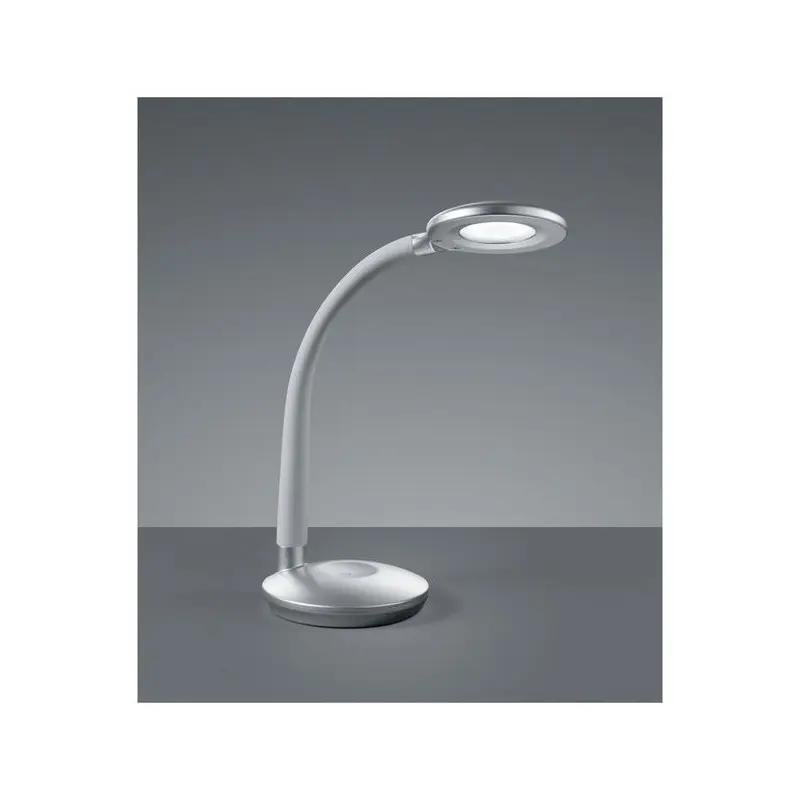 Lampe de bureau moderne avec bras flexible et tête lumineuse allumée.