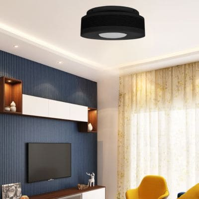 purificateur air sanso noir dans un salon blanc et bleu marine 